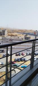 a view of a parking lot with parked cars at The Panoramic View - Luxury Apartments in Cairo in Cairo