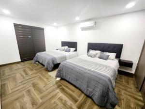 Postel nebo postele na pokoji v ubytování Departamento Pitagoras No 3