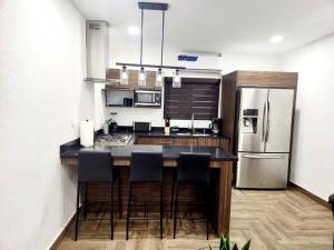 Kuchyň nebo kuchyňský kout v ubytování Departamento Pitagoras No 3 + 10 fotografií