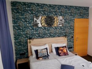 Krevet ili kreveti u jedinici u okviru objekta Pension Central Semmering