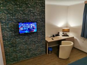 TV i/ili multimedijalni sistem u objektu Pension Central Semmering