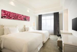 Postelja oz. postelje v sobi nastanitve Four Points by Sheraton Bandung