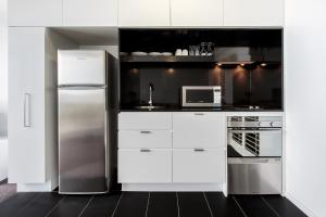 Eldhús eða eldhúskrókur á Code Apartments