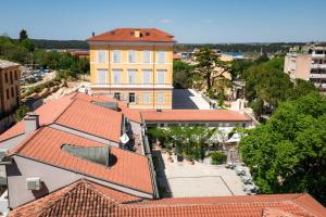 an overhead view of a building with red roofs at Polai Panorama Apartments with FREE Parking in Pula