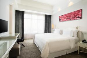 Postelja oz. postelje v sobi nastanitve Four Points by Sheraton Bandung
