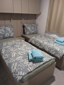 Postel nebo postele na pokoji v ubytování Mobile Home Sunny Side