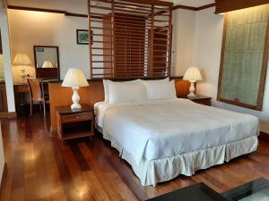 Letto o letti in una camera di Wonderland Private Pool Villas at Port Dickson