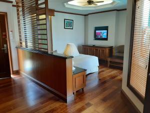 TV o dispositivi per l'intrattenimento presso Wonderland Private Pool Villas at Port Dickson