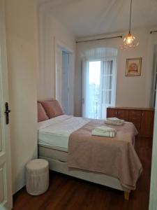 Postel nebo postele na pokoji v ubytování Queen of Stay - Apartment Lili