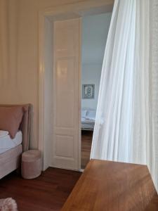 Postel nebo postele na pokoji v ubytování Queen of Stay - Apartment Lili