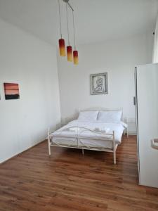 Postel nebo postele na pokoji v ubytování Queen of Stay - Apartment Lili