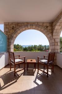 Balkón nebo terasa v ubytování Voula Resort + 37 fotografií