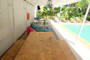 Bazén v ubytování Palm Garden Kuta nebo v jeho okolí