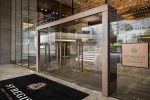 an entrance to a building with a glass door at St. Regis Macao in Macau