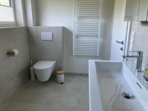 Kúpeľňa v ubytovaní Lagom Haus