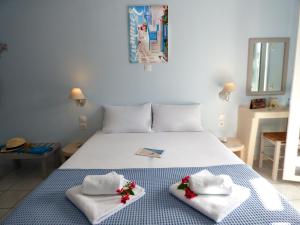 Postel nebo postele na pokoji v ubytování Tasoula Guest House