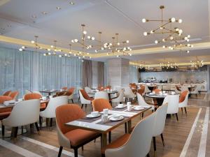 Restaurant o un lloc per menjar a Kyriad Marvelous Hotel Hezhou Wanda Plaza