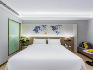 Fotografie z fotogalerie ubytování Kyriad Hotel Jiujiang Happy City v destinaci Jiujiang