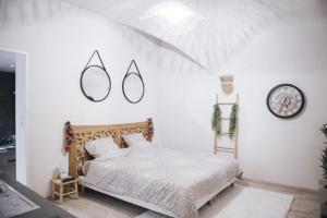 Postel nebo postele na pokoji v ubytování appartement 2 pièces jacuzzi