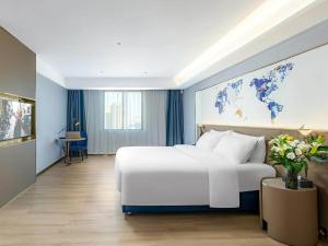 Fotografie z fotogalerie ubytování Kyriad Hotel Jiujiang Happy City v destinaci Jiujiang + 23 fotografií