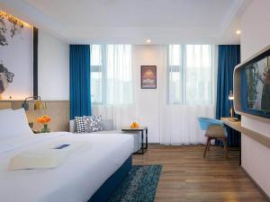 Photo de la galerie de l'établissement Kyriad Marvelous Hotel Chengdu Wuhou Shuangnan, à Chengdu