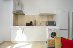 Kuchyň nebo kuchyňský kout v ubytování -MalagaSunApts-Pop Dream CityCentre + 5 fotografií