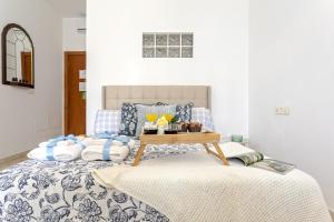 Posteľ alebo postele v izbe v ubytovaní -MalagaSunApts-Pop Dream CityCentre