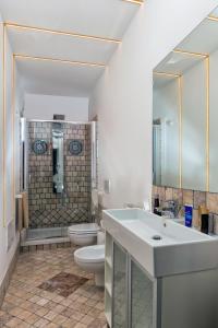 Kúpeľňa v ubytovaní Giasone Apartments