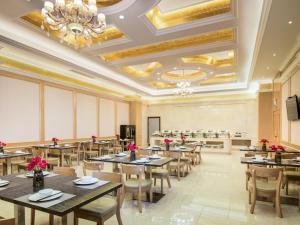 Εστιατόριο ή άλλο μέρος για φαγητό στο Vienna International Hotel Zhejiang Wuyi Hushan