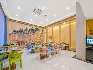 Restavracija oz. druge možnosti za prehrano v nastanitvi Vienna Classic Hotel Wenzhou Cangnan High-Speed Railway Station Shop