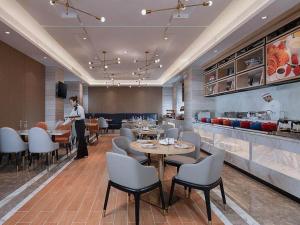 Restoranas ar kita vieta pavalgyti apgyvendinimo įstaigoje Kyriad Marvelous Hotel Huizhou South Station Danshui YI Center