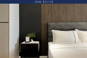 Postel nebo postele na pokoji v ubytování Chambers Suite Studio KLCC PWTC by Unimax