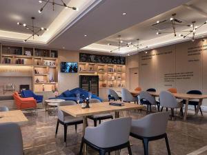 Χώρος καθιστικού στο Kyriad Marvelous Hotel Huizhou South Station Danshui YI Center +6 φωτογραφίες