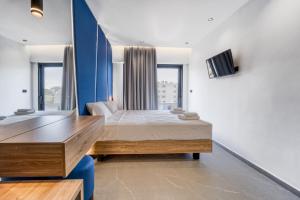 Uma TV ou centro de entretenimento em Island Sea Side Hotel - Adults Only
