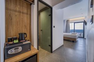 Cama ou camas em um quarto em Island Sea Side Hotel - Adults Only