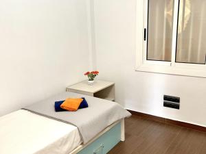 Кровать или кровати в номере APARTBEACH EUROPEOS JUNTO PLAYA CLIMATIZADO CON GRAN TERRAZA y MUY LUMINOSO +46 фотографий