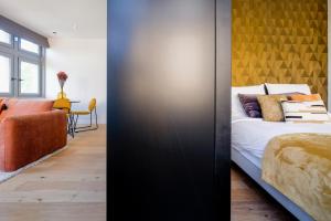 Postel nebo postele na pokoji v ubytování HONORÊ SUITE VUE SAONE + 5 fotografií