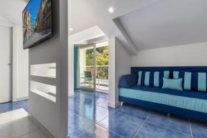TV a/nebo společenská místnost v ubytování Hotel Metropole