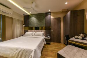 Postel nebo postele na pokoji v ubytování Hotel Orient Regency