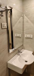 Koupelna v ubytování Hotel Krishna