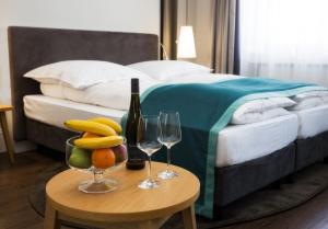 Postel nebo postele na pokoji v ubytování Hotel am Markt