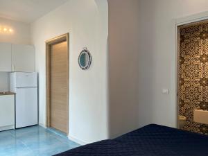 Kuchyň nebo kuchyňský kout v ubytování Verdalia Liatris - Piano Terra Spiaggia a 200m By Cala Salento