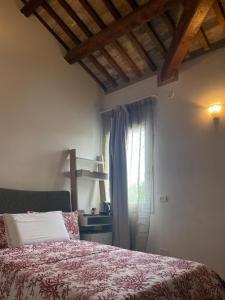 Postel nebo postele na pokoji v ubytování A casa di V-Ale