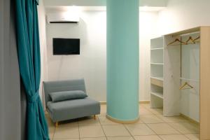 TV a/nebo společenská místnost v ubytování Donna Elena B&B + 28 fotografií