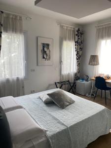 Postel nebo postele na pokoji v ubytování A casa di V-Ale
