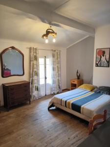 Säng eller sängar i ett rum på Typique maison catalane