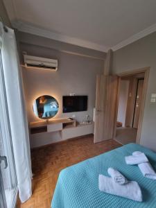 Krevet ili kreveti u jedinici u okviru objekta Piraeus open view Appartment