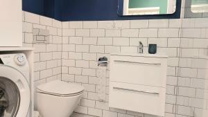 A bathroom at Apartament Mariacka