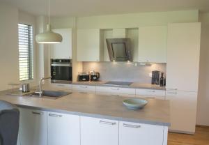 Kuchyň nebo kuchyňský kout v ubytování Ferienhaus Röns