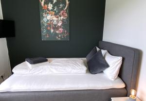 Postel nebo postele na pokoji v ubytování Ferienhaus Röns